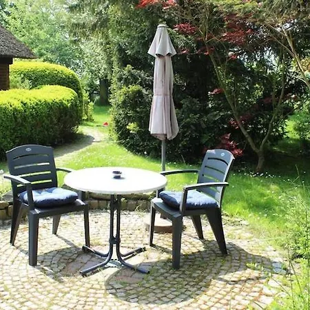 Im Reetdachhaus, * Burhave